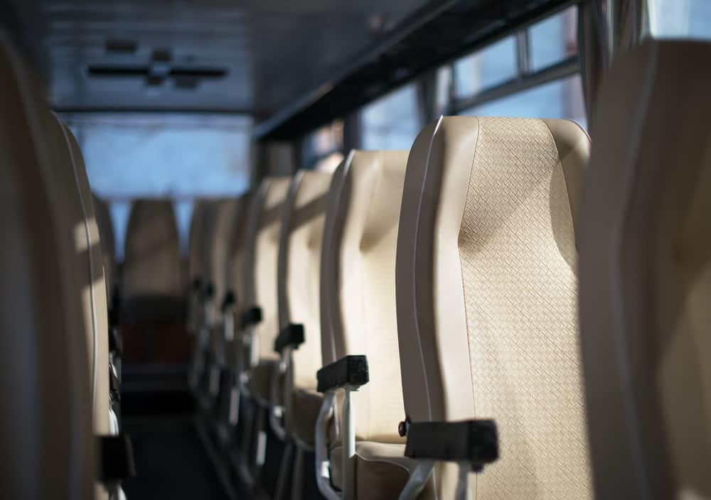Tan charter bus seat